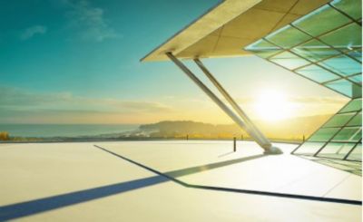 View from a rooftop of sea and land, Traditional hosting | DXC Technology Customer Story